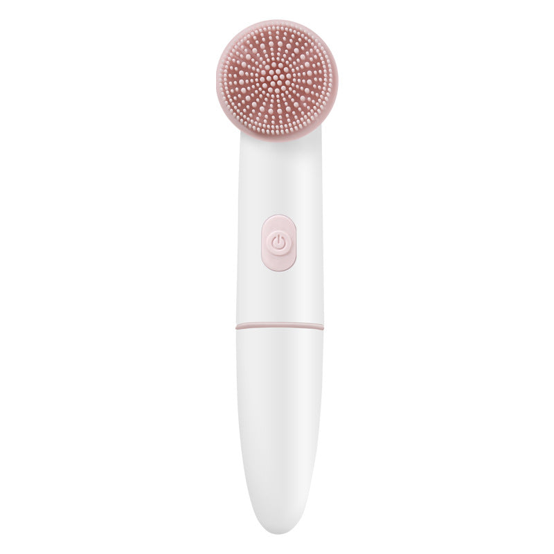 Sonic cleansing brush in use on the face