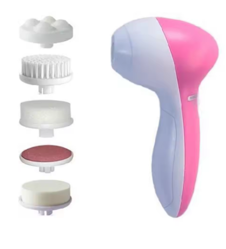 Electric facial cleansing brush held in hand